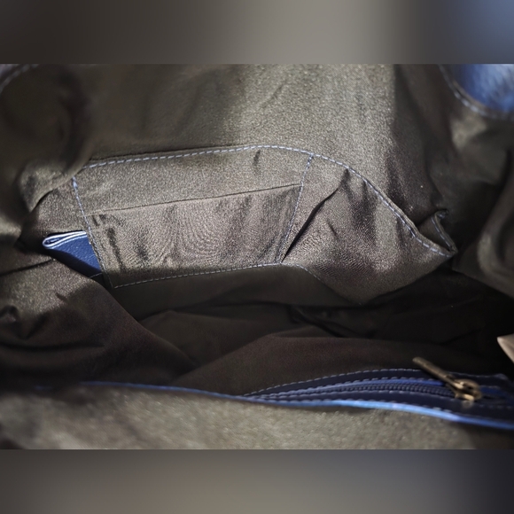 Periwinkle Convertible Leather Backpack with matching tri fold wallet